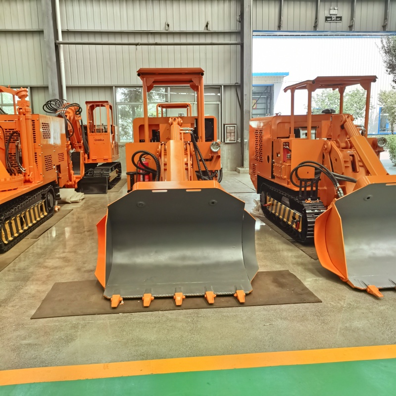 Side Dump Rock Loader