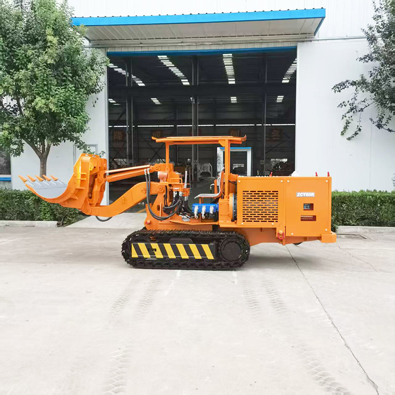 Cargadora de rocas con volquete lateral sobre orugas