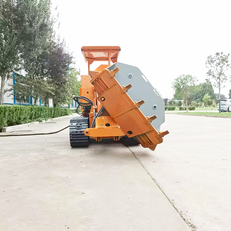 Grande chargeuse à roches à déversement latéral