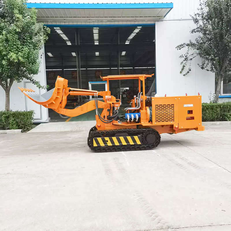 Máy xúc lật đá tự đổ bên hông dành cho kỹ sư