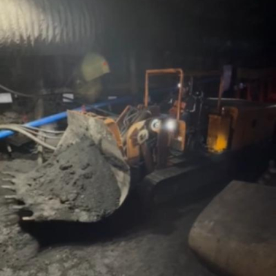 Carregador de descarga lateral